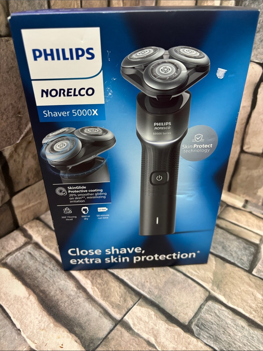 New Philips Norelco Shaver 5000X wet and dry electric shaver.